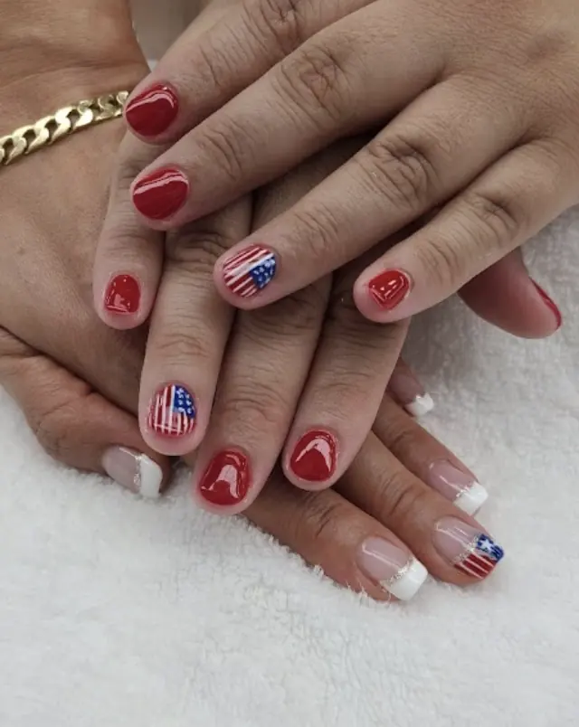 Red gel nails with American flag nail art