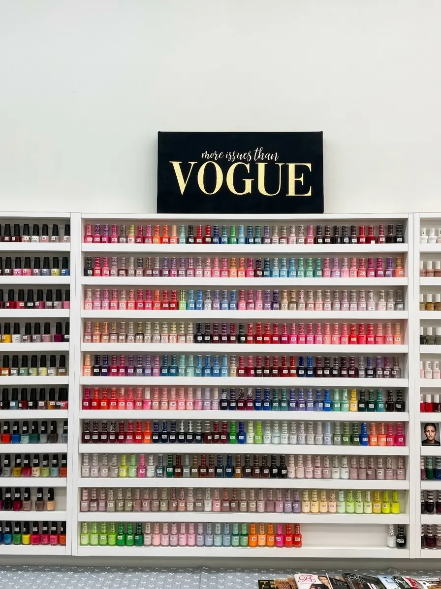 Wall of hundreds of gel polish colors at Vogue Nails & Spa
